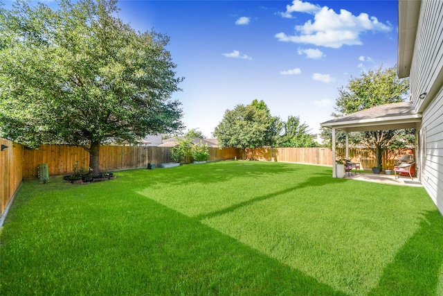 2014 Fisher Trace Ct, Spring, TX 77373 - fenced backyard with a patio area