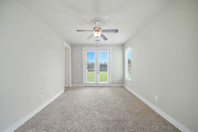 151 E 2nd St, Houston, TX 77007 - empty room with ceiling fan and light colored carpet