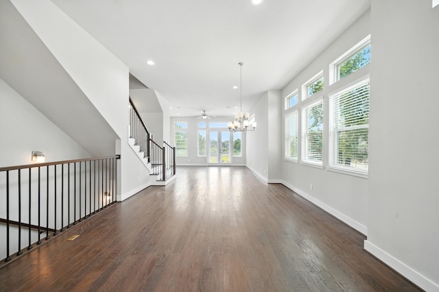 151 E 2nd St, Houston, TX 77007 - empty room featuring healthy amount of natural light, dark wood-style flooring, a chandelier, and recessed lighting