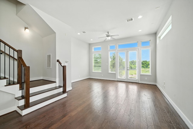 151 E 2nd St, Houston, TX 77007 - unfurnished living room featuring dark wood-style flooring, a ceiling fan, stairs, and recessed lighting