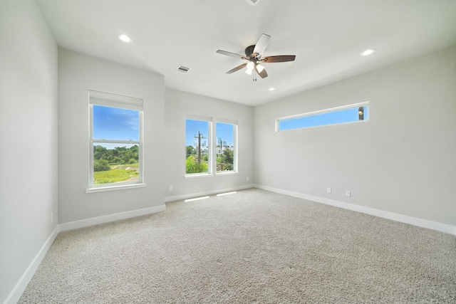 151 E 2nd St, Houston, TX 77007 - carpeted empty room featuring plenty of natural light, a ceiling fan, and recessed lighting