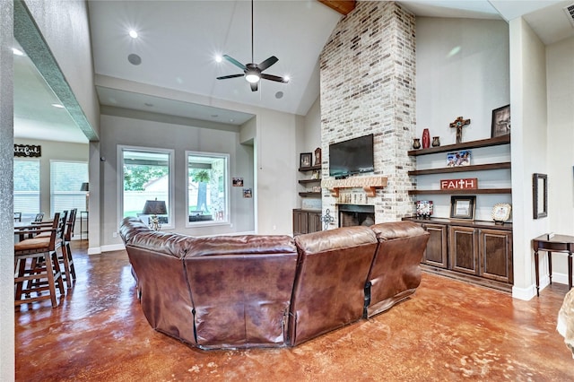 3403 Westhaven Ct, Fulshear, TX 77441 - living area with concrete floors, high vaulted ceiling, a brick fireplace, and ceiling fan