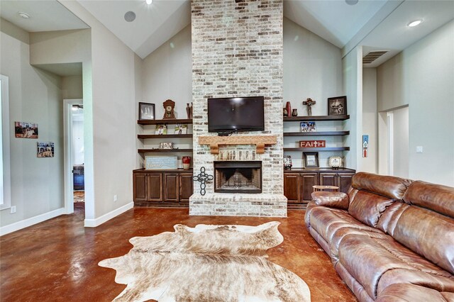 3403 Westhaven Ct, Fulshear, TX 77441 - living area with concrete floors, high vaulted ceiling, and a brick fireplace