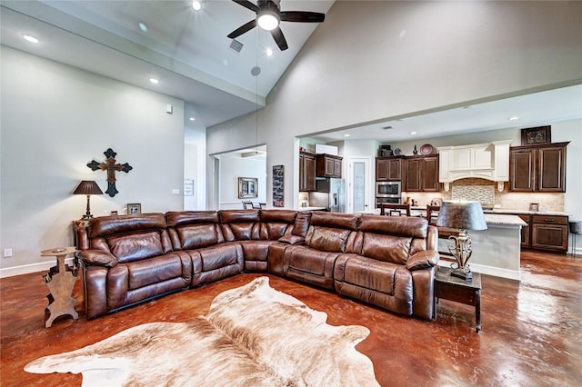 3403 Westhaven Ct, Fulshear, TX 77441 - living area featuring finished concrete flooring, high vaulted ceiling, ceiling fan, and recessed lighting