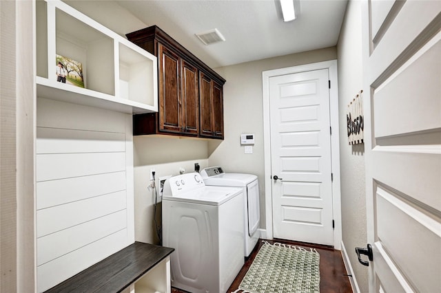 3403 Westhaven Ct, Fulshear, TX 77441 - washroom with washing machine and clothes dryer, cabinet space, and dark wood-type flooring