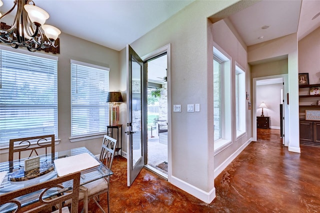 3403 Westhaven Ct, Fulshear, TX 77441 - dining room with finished concrete floors, a chandelier, and plenty of natural light
