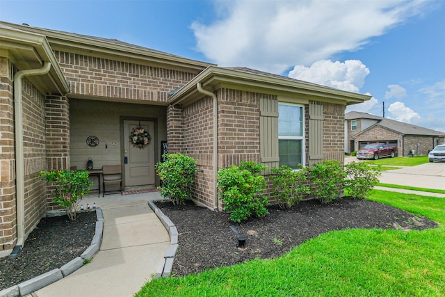 826 Green Clover Ln, Rosharon, TX 77583 - doorway to property featuring brick siding