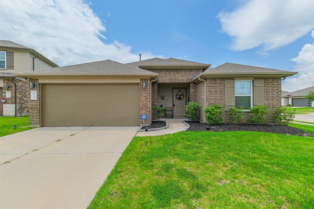 826 Green Clover Ln, Rosharon, TX 77583 - view of front of home with brick siding, a garage, a front lawn, and driveway