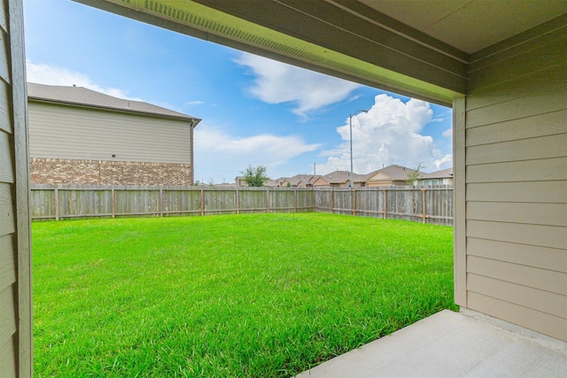 826 Green Clover Ln, Rosharon, TX 77583 - fenced backyard with a patio area