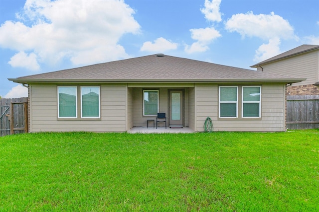 826 Green Clover Ln, Rosharon, TX 77583 - back of house with a fenced backyard, a patio area, and a shingled roof