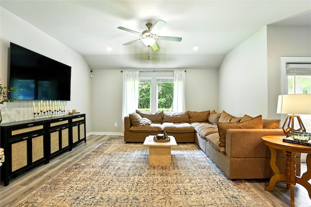 621 Little Spring Ct, Anahuac, TX 77514 - living room with wood finished floors, a ceiling fan, healthy amount of natural light, vaulted ceiling, and recessed lighting