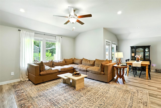 621 Little Spring Ct, Anahuac, TX 77514 - living area featuring wood finished floors, lofted ceiling, ceiling fan, and recessed lighting