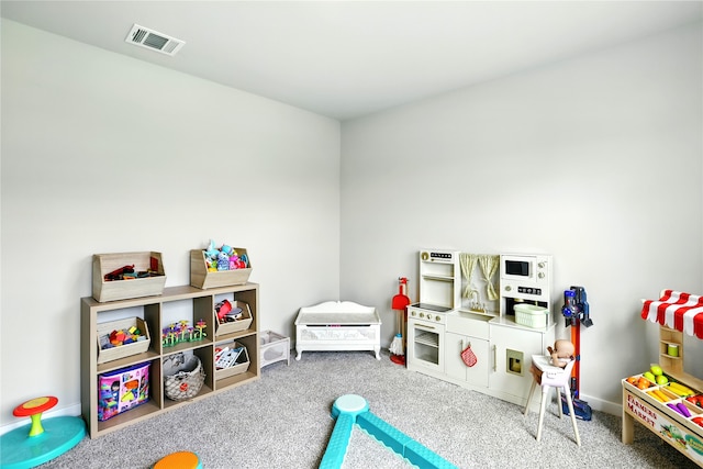 621 Little Spring Ct, Anahuac, TX 77514 - rec room with carpet floors and baseboards