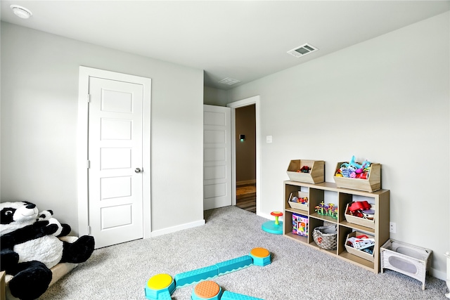 621 Little Spring Ct, Anahuac, TX 77514 - playroom with carpet and baseboards