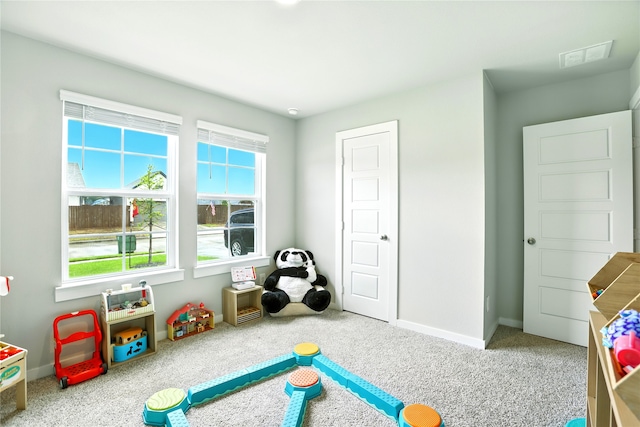 621 Little Spring Ct, Anahuac, TX 77514 - recreation room with carpet flooring and baseboards