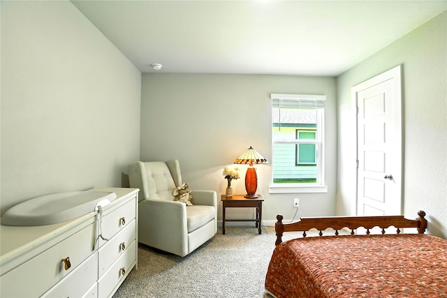 621 Little Spring Ct, Anahuac, TX 77514 - bedroom featuring light colored carpet and baseboards