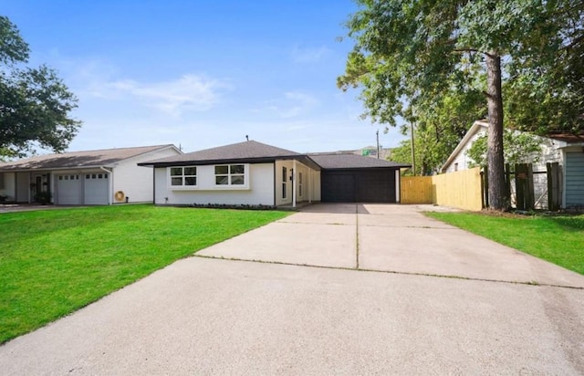 202 Sylvia St, Deer Park, TX 77536 - ranch-style home with an attached garage and concrete driveway