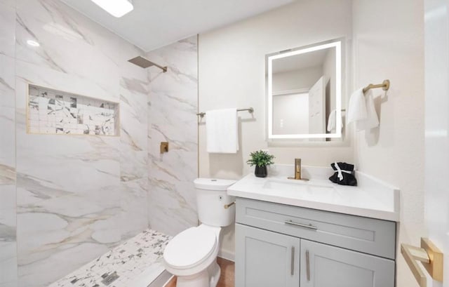 202 Sylvia St, Deer Park, TX 77536 - bathroom featuring vanity and a marble finish shower