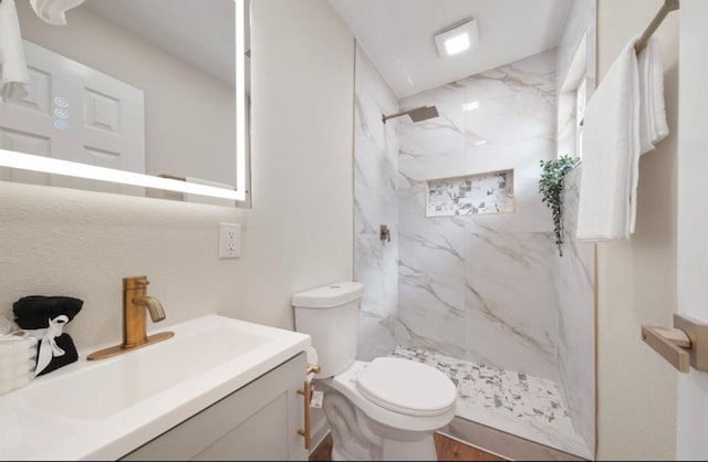 202 Sylvia St, Deer Park, TX 77536 - full bathroom featuring vanity and a marble finish shower