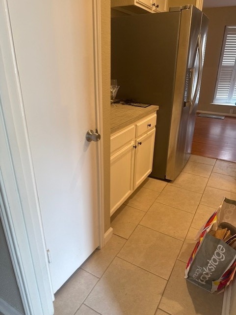 7955 Fawn Terrace Dr, Houston, TX 77071 - laundry room with light tile patterned floors