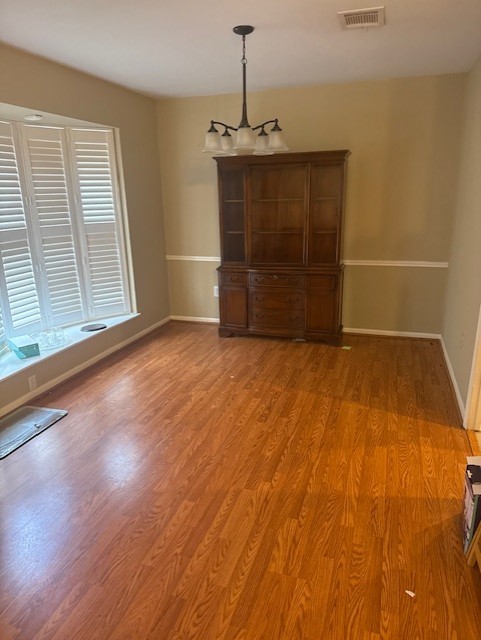 7955 Fawn Terrace Dr, Houston, TX 77071 - unfurnished dining area with light wood finished floors and baseboards