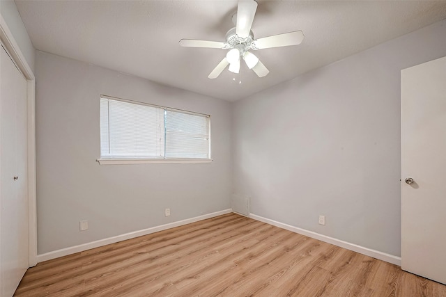 23131 Earlmist Dr, Spring, TX 77373 - unfurnished bedroom with light wood-type flooring, a closet, and a ceiling fan