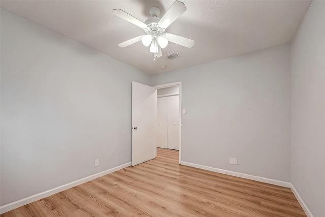 23131 Earlmist Dr, Spring, TX 77373 - unfurnished bedroom with light wood-type flooring and a ceiling fan