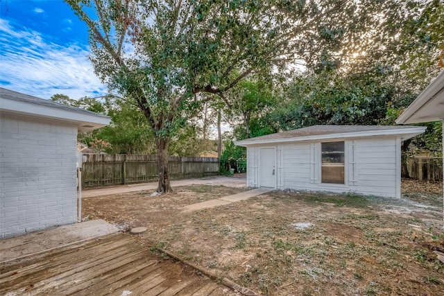 23131 Earlmist Dr, Spring, TX 77373 - view of yard featuring an outbuilding and a deck