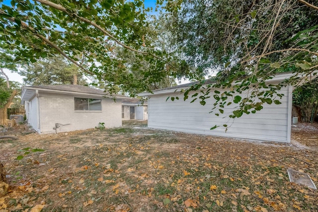 23131 Earlmist Dr, Spring, TX 77373 - rear view of house featuring brick siding