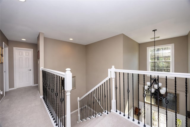 1906 Nogalus Dr, Houston, TX 77532 - hall featuring an upstairs landing, carpet, recessed lighting, and a chandelier