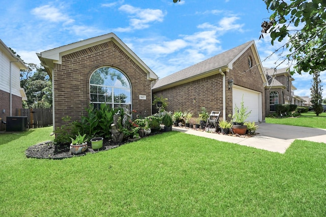 7807 Board Xing, Conroe, TX 77304 - view of front of property with brick siding, a garage, driveway, and a shingled roof