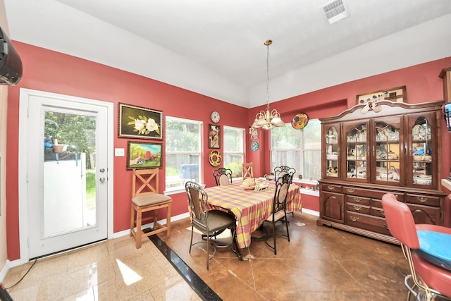 7807 Board Xing, Conroe, TX 77304 - dining space featuring a chandelier and vaulted ceiling