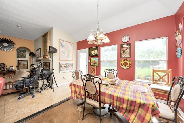 7807 Board Xing, Conroe, TX 77304 - dining area featuring a chandelier and lofted ceiling