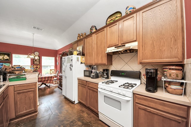 7807 Board Xing, Conroe, TX 77304 - kitchen featuring white appliances, under cabinet range hood, a chandelier, light countertops, and hanging light fixtures