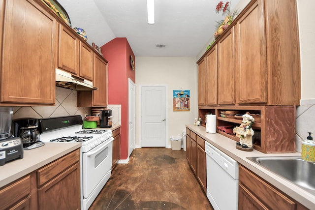7807 Board Xing, Conroe, TX 77304 - kitchen with white appliances, under cabinet range hood, decorative backsplash, light countertops, and brown cabinetry