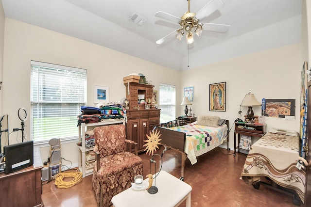 7807 Board Xing, Conroe, TX 77304 - bedroom featuring finished concrete floors, multiple windows, a ceiling fan, and a desk