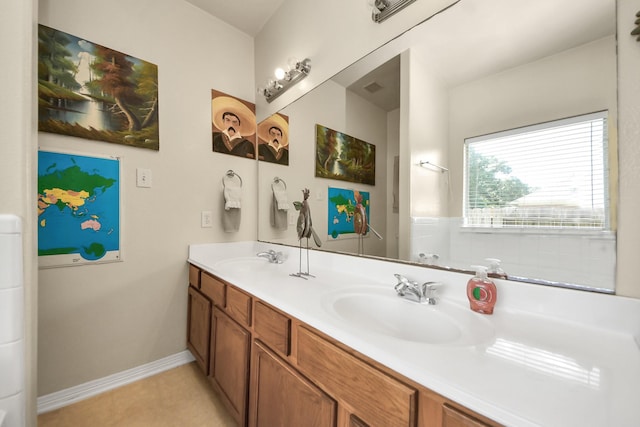 7807 Board Xing, Conroe, TX 77304 - full bathroom with double vanity and baseboards