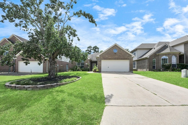 7807 Board Xing, Conroe, TX 77304 - view of front of home with brick siding, a garage, driveway, and a front yard