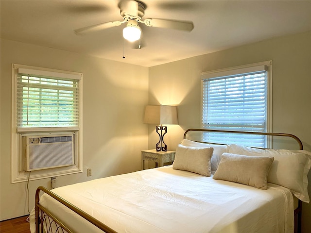 338 Cortlandt St, Houston, TX 77007 - bedroom featuring a ceiling fan and wood finished floors