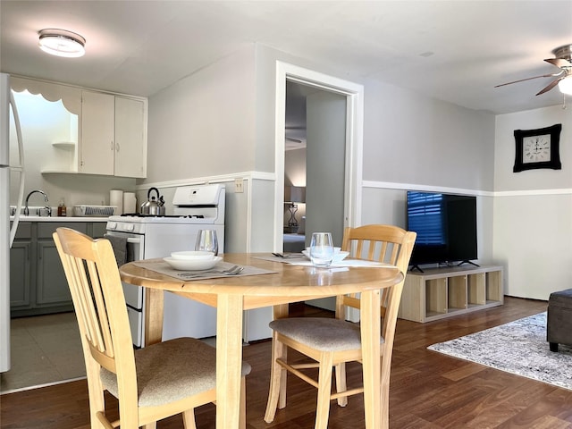 338 Cortlandt St, Houston, TX 77007 - dining area with a ceiling fan and dark wood-type flooring