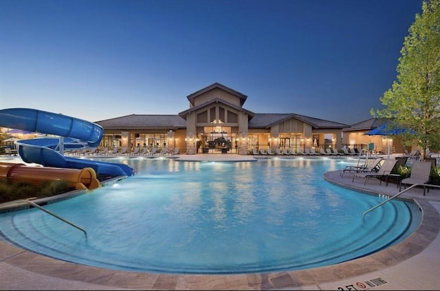 29526 Paytons Park Ln, Katy, TX 77494 - community pool featuring a water slide and a patio