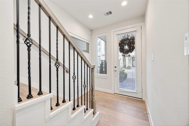 108 Knightsbridge Park Ln, Houston, TX 77018 - foyer entrance with light wood finished floors, recessed lighting, and stairway