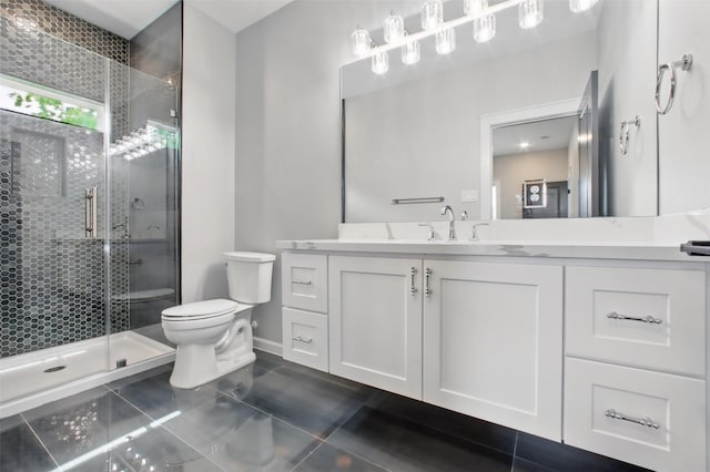 4719 Mallow St, Houston, TX 77033 - bathroom with a shower stall, vanity, and tile patterned flooring