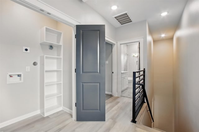 4719 Mallow St, Houston, TX 77033 - hall with an upstairs landing and light wood finished floors