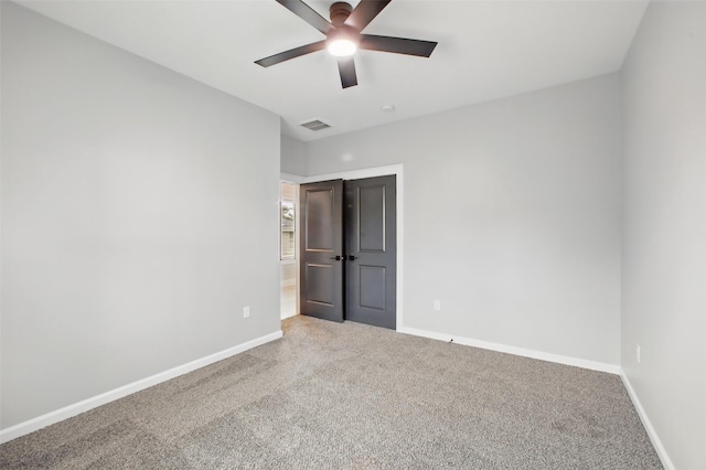 4719 Mallow St, Houston, TX 77033 - unfurnished bedroom featuring carpet floors and ceiling fan