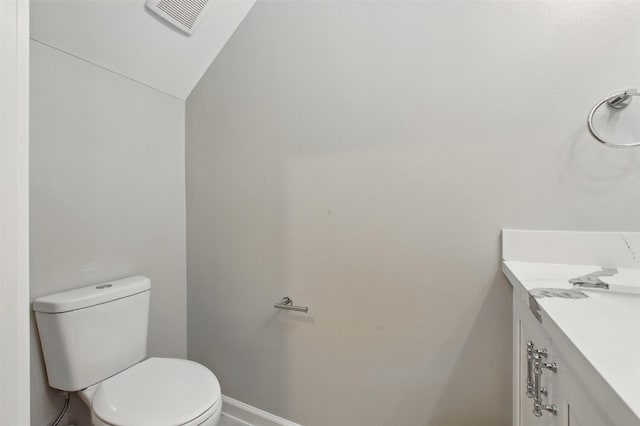 4719 Mallow St, Houston, TX 77033 - half bathroom featuring vanity and vaulted ceiling