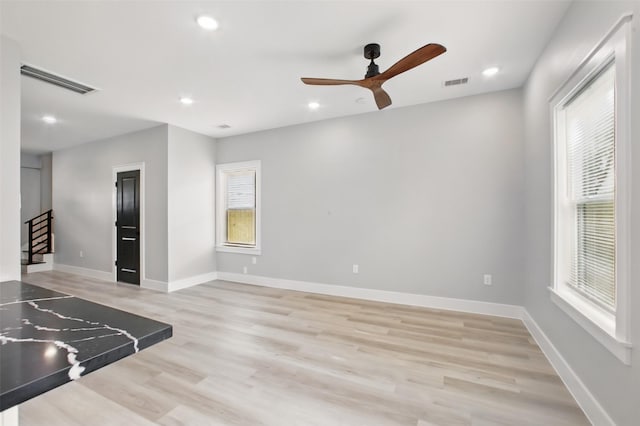 4719 Mallow St, Houston, TX 77033 - kitchen with plenty of natural light, a ceiling fan, light wood finished floors, and recessed lighting