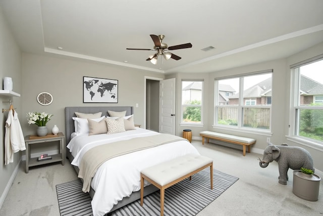 4407 Archer Meadow Ln, Sugar Land, TX 77479 - bedroom featuring light colored carpet, a raised ceiling, and a ceiling fan