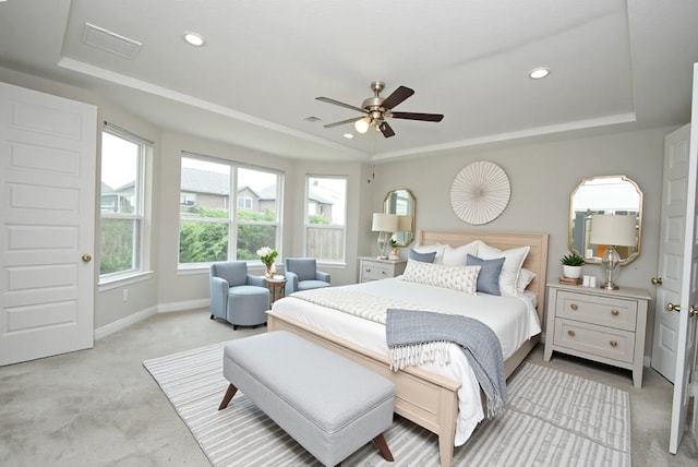 4407 Archer Meadow Ln, Sugar Land, TX 77479 - bedroom featuring a tray ceiling, light colored carpet, recessed lighting, and a ceiling fan