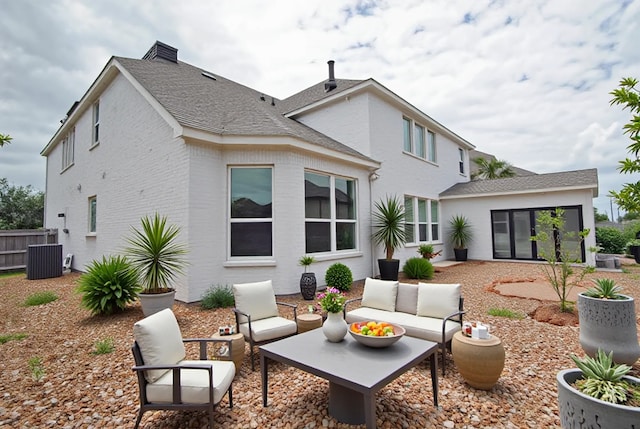 4407 Archer Meadow Ln, Sugar Land, TX 77479 - back of property with a patio, outdoor lounge area, and brick siding